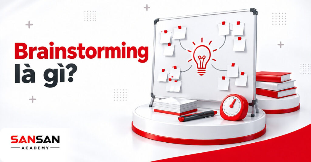 Bảng trắng Brainstorming với giấy nhớ gom quanh bóng đèn đỏ ở giữa, bút dạ, tập giấy nhớ và đồng hồ hẹn giờ