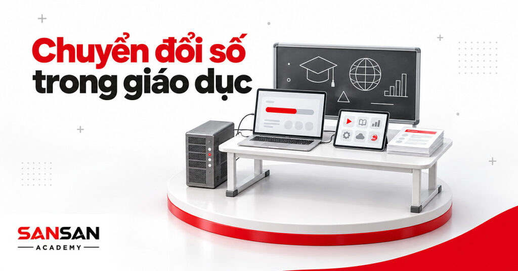 Bàn học với laptop, máy tính bảng, phiếu bài làm và bảng phấn minh họa chuyển đổi số trong giáo dục